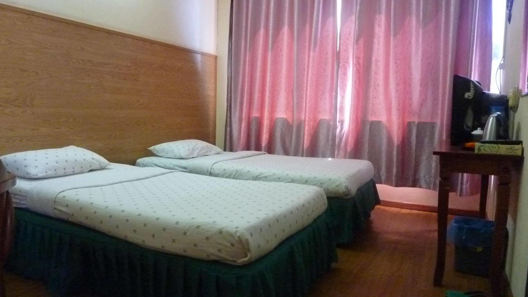 7 Hung Hung Inn Kota Kinabalu Bagian luar foto