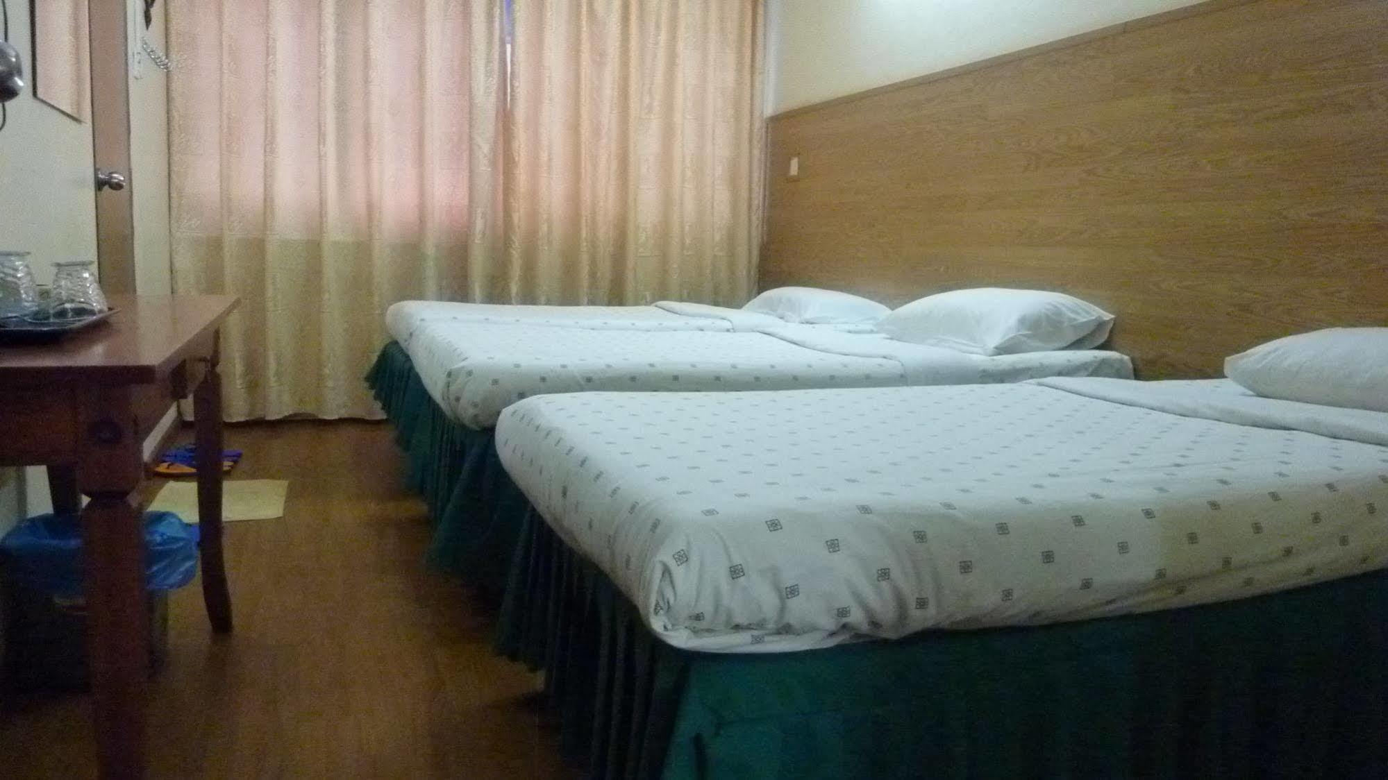 7 Hung Hung Inn Kota Kinabalu Bagian luar foto