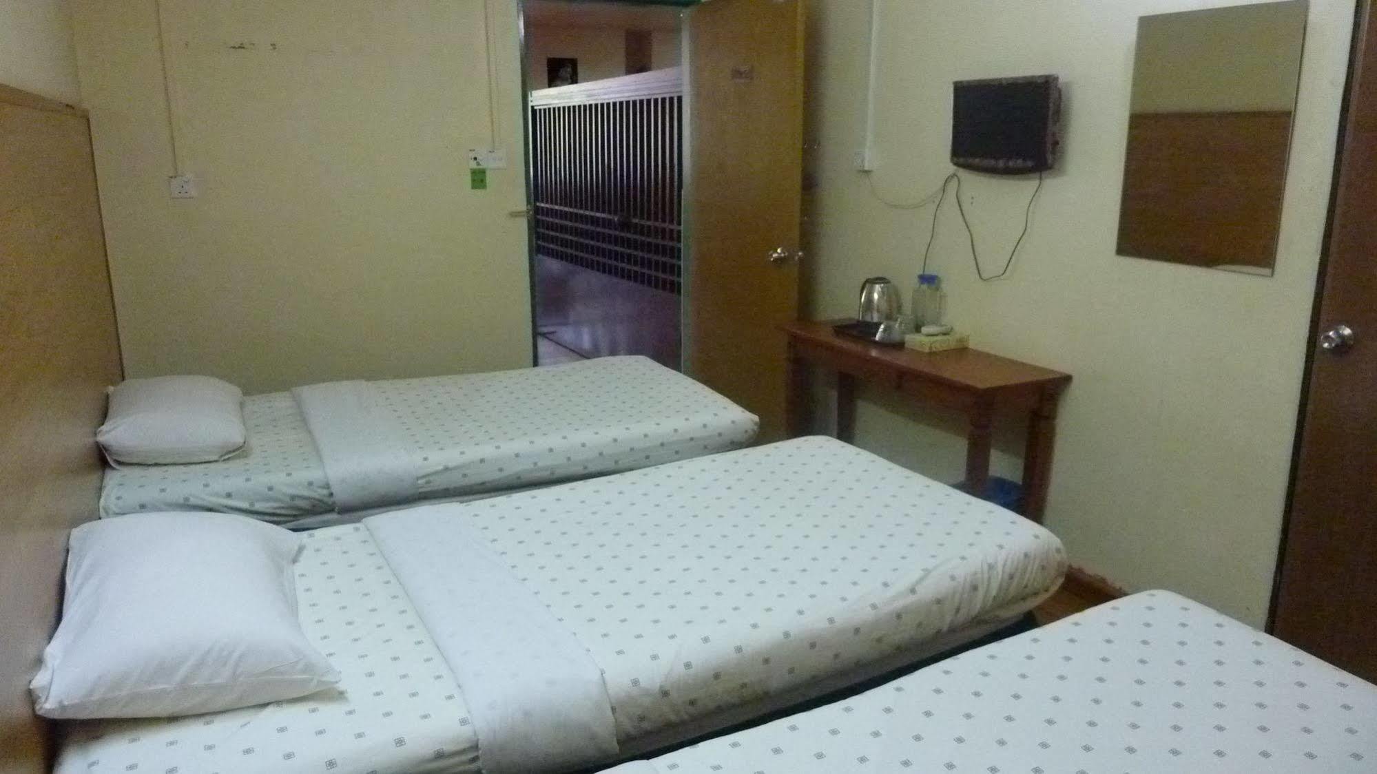 7 Hung Hung Inn Kota Kinabalu Bagian luar foto